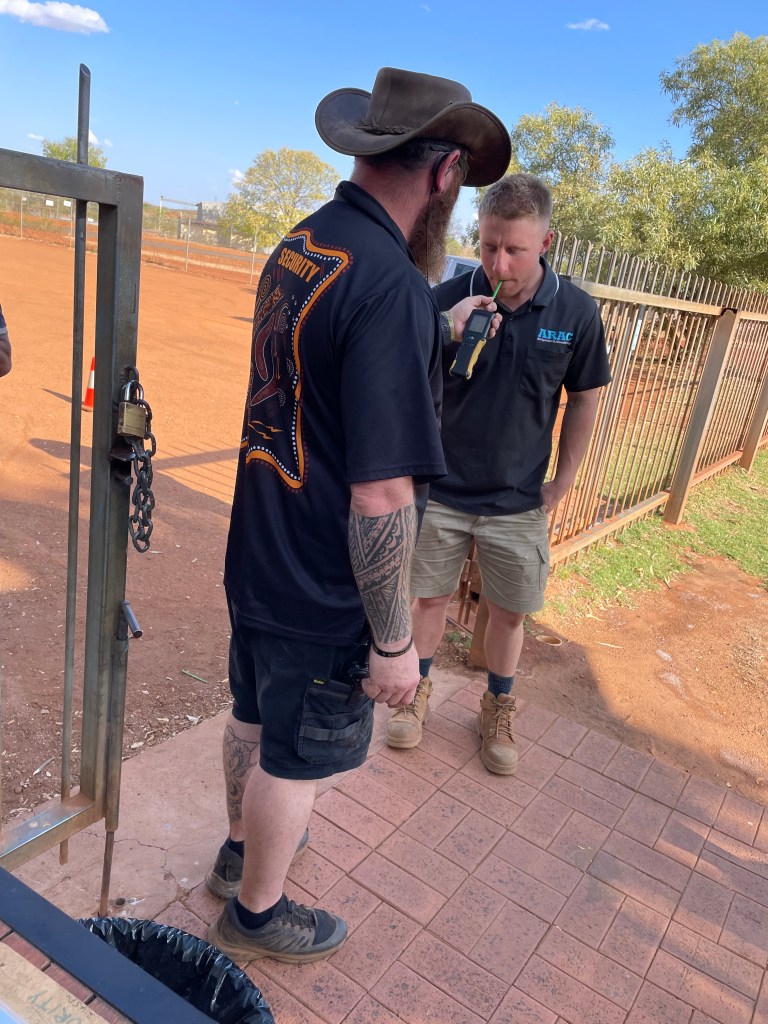 Jimmy checking in a perspective patron at the car park gate where breath-testing was mandatory when I first arrived.